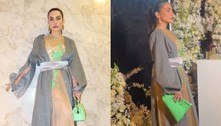 Cleo usa vestido nude com transparência para compor look diferentão em evento em São Paulo