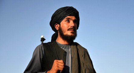 Lal Muhammad é oficial da polícia e comemora a estabilidade do país sob o domínio do Talibã