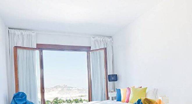 Complemente a decoração do quarto de casal com puff gigante