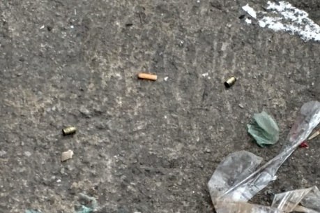 Cápsulas no chão após disparos na Cracolândia
