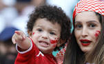 Criança está preparada para ver a Tunísia enfrentar a Dinamarca na Copa do Mundo