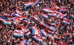 Soccer Football - World Cup - The Croatia team return from the World Cup in Russia - Zagreb, Croatia - July 16, 2018 General view as Croatia fans stand on a rooftop near the main square in Zagreb while they await the arrival of the team REUTERS/Marko Djurica