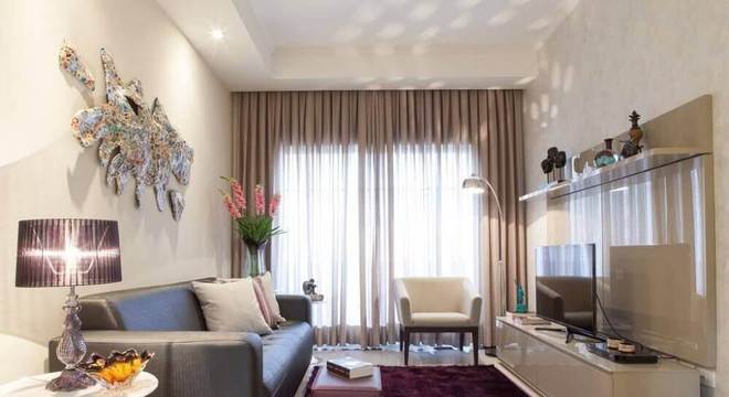 decoração sala de estar com paleta de cores claras