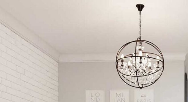 design arrojado de pendente para quarto branco com parede de tijolinho