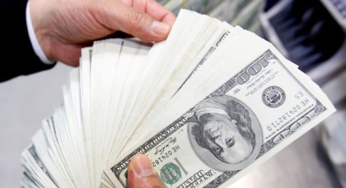 Dólar tem forte queda e fecha a R$ 5,25, com clima positivo global -  Notícias - R7 Economia