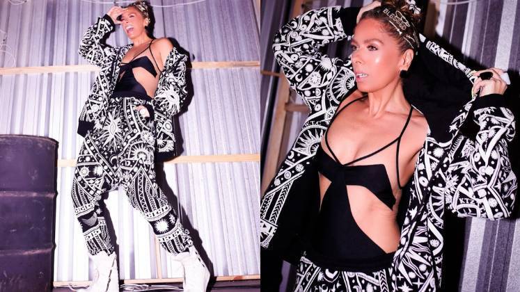 Na prova das mulheres, ela deixou todos de queixo caído, com um conjunto de
estampa hippie, uma botinha branca e os melhores acessórios compondo o penteado. Ela entregou tudo no figurino!