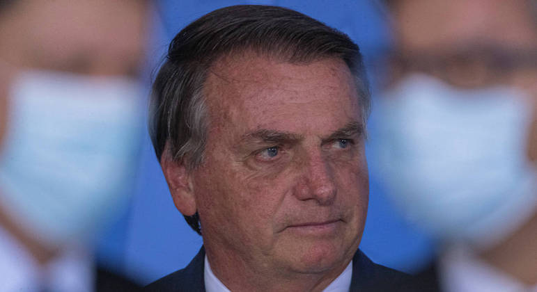 BRA113. BRASILIA (BRASIL), 02/09/2021. - El presidente de Brasil, Jair Bolsonaro, participa en la ceremonia de lanzamiento de Autorizaciones Ferroviarias, este jueves en el Palacio do Planalto, en la ciudad de Brasilia. EFE/ Joedson Alves