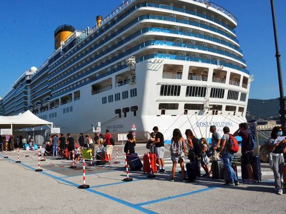 Trieste (Italy), 06/09/2020.- Passengers embark on the Costa Deliziosa the first cruise ship, of the company Carnival, to return to the sea after the lockdown, Trieste, Italy, 06 September 2020. (Italia) EFE/EPA/MAURO ZOCCHI
