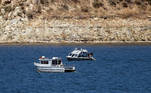 Lake Piru (United States), 10/07/2020.- Search boats look for missing US actress Naya Rivera on Lake Piru as searches continue after her disappearance while boating with her young son in Los Padres National Forest, California, USA, 10 July 2020. Rivera starred in the 'Glee' television show, and went missing after renting a boat and going out on the lake with her four-year-old son on 08 July. (Estados Unidos) EFE/EPA/ETIENNE LAURENT