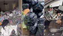 Equipe de limpeza encontra 10 mil latas cheias de xixi e milhões de baratas em casa abandonada