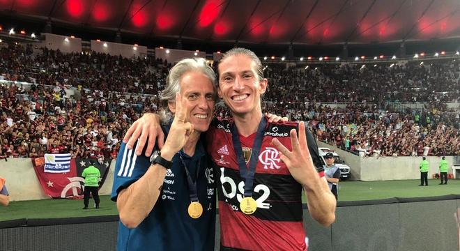 Jorge Jesus e Filipe Luís. Três títulos em dez dias. Impressionante