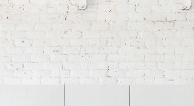 Gabinete classic blue com parede em tijolinho