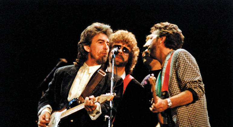 George Harrison com Jeff Lynne, Elton John e Eric Clapton ao vivo no "Prince’s Trust Rock Gala" em 1987