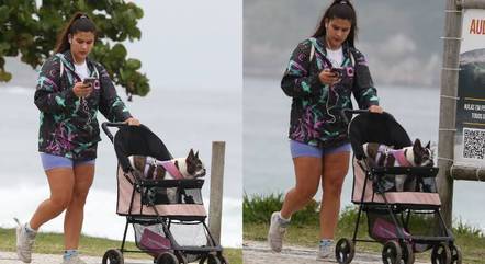 Giulia Costa passeia com seu Pet na orla da praia da Barra da Tijuca