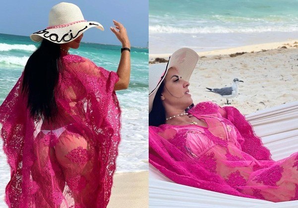 Graci também arrasa nos acessórios para compor seus lookinhos de praia. Destaque para o chapéu que carrega o nome da influenciadora e a saída de praia rosa toda trabalhada na transparência. É puro charme e sensualidade