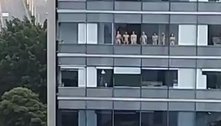 Grupo com 11 pessoas ocupa janelas de prédio de luxo e escandaliza vizinhança 