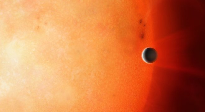 Ilustração do exoplaneta NGTS-4b, chamado de 'planeta proibido'; 'achávamos que esse planeta não poderia estar ali'