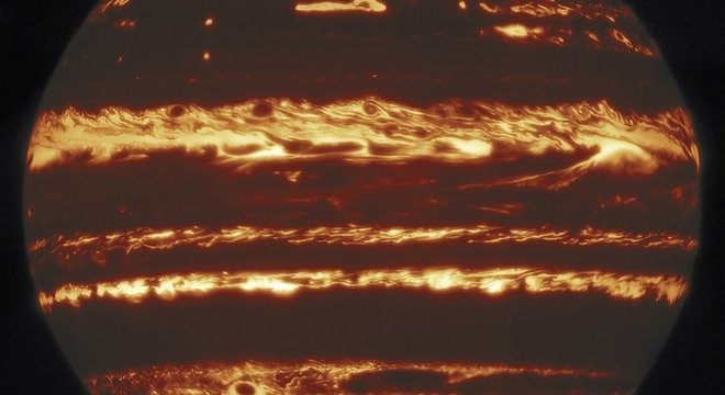  As regiões de calor abaixo das nuvens de gás foram definidas com muitos detalhes na imagem