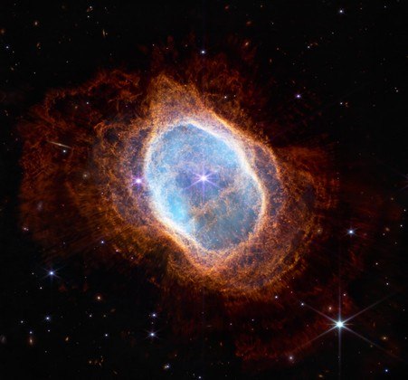the bright star at the center of NGC 3132, while prominent when viewed by the James Webb Space Telescope (JWST) in near-infrared light, plays a supporting role in sculpting the surrounding nebula. A second star, barely visible at lower left along one of the bright star’s diffraction spikes, is the nebula’s source. It has ejected at least eight layers of gas and dust over thousands of years. The JWST is the most powerful telescope launched into space and it reached its final orbit around the sun, approximately 930,000 miles from Earths orbit, in January, 2022. The technological improvements of the JWST and distance from the sun will allow scientists to see much deeper into our universe with greater detail.