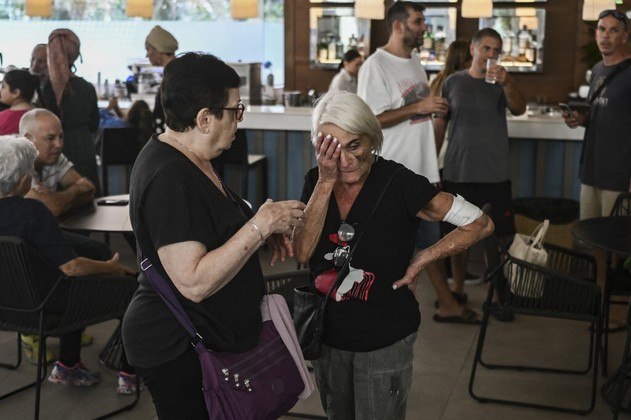 'Isso é uma tragédia como o 11 de Setembro' nos Estados Unidos, opinou o historiador Alan Pauker, de 57 anos. 'O lugar onde moro nunca mais será o mesmo'