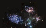 Apesar de se tratar de um quinteto, apenas quatro das galáxias estão realmente próximas uma das outras. A quinta galáxia, que está mais à esquerda na imagem, chamada de NGC 7320, está a cerca de 40 milhões de anos-luz da Terra, enquanto as outras quatro estão a cerca de 290 milhões de anos-luz de distância