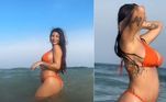 Jheny Santucci mostra barriga de grávida na praia