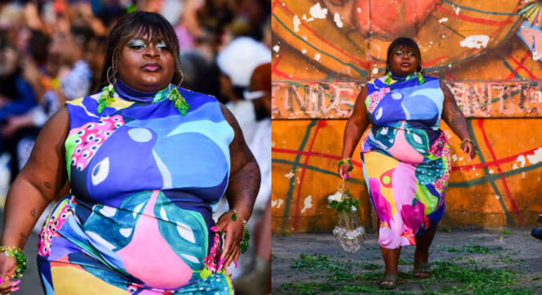 Jojo Todynho apareceu nas passarelas com o novo cabelo e fez questão de sorrir para as câmeras. A artista usou um vestido todo coladinho e supercolorido, além de uma argola com uma plantinha pendurada