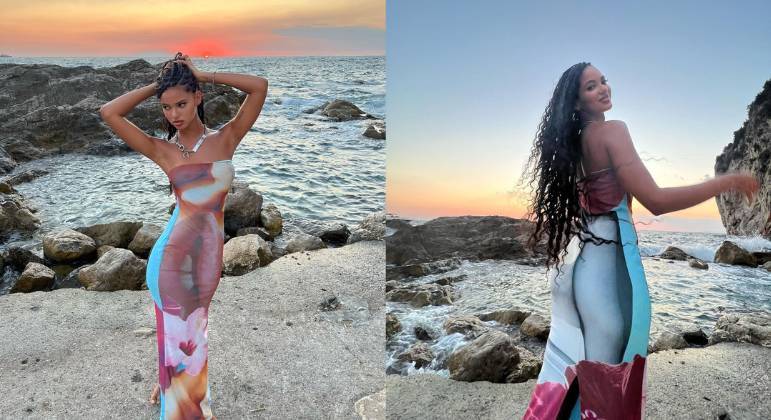 Com um colar da Dior e um vestido com estampa psicodélica, a brasileira arrasou numa foto durante o pôr do Sol