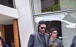 Keanu Reeves de boné e óculos escuros