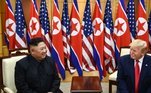 Kim e Trump sentados