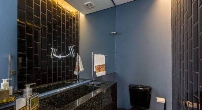 Lavabo com cuba moderna feito com granito verde ubatuba