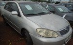 No lote 91, um Toyota Corolla cinza