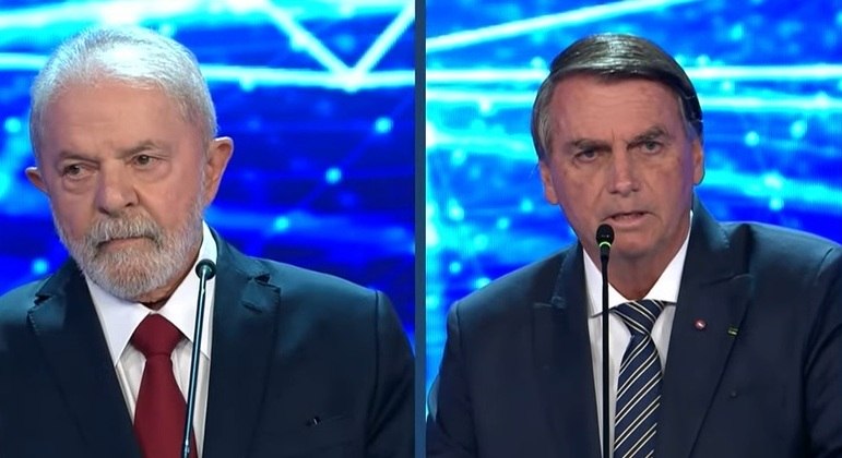 Ex-presidente Lula e o presidente Jair Bolsonaro durante o debate da TV Bandeirantes