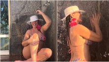 Luma de Oliveira posa de biquíni ao se refrescar em ducha; veja fotos