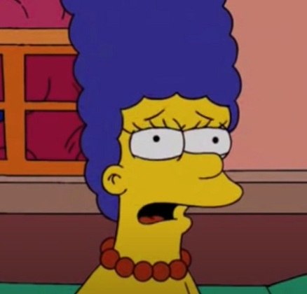 Marge Simpson - Ela é a esposa de Homer e é quem mais lida, de maneira paciente, com as maluquices do marido.