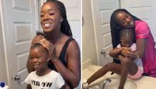 Mãe encanta web ao ensinar filhas sobre amor-próprio de forma fofa enquanto penteia o cabelo delas
