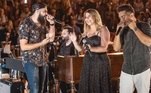 Henrique e JulianoA cantora não só compôs músicas para a dupla, como participou de sucessos como Completa a Frase, de 2017