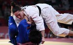 Brazil's Mayra Aguiar (white) and South Korea's Hyunji Yoon compete in the judo women's -78kg bronze medal B bout during the Tokyo 2020 Olympic Games at the Nippon Budokan in Tokyo on July 29, 2021.
Jack GUEZ / AFP