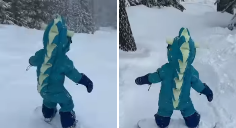 Aubrin Sage, vestida de dinossauro, brinca na neve, no melhor estilo 'Frozen'
