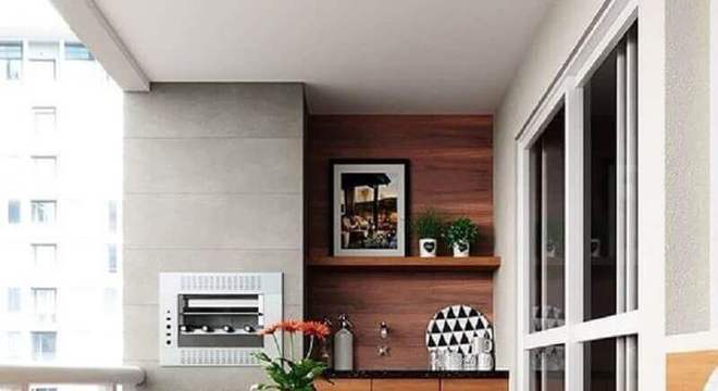 mesa e cadeira para varanda de apartamento com churrasqueira
