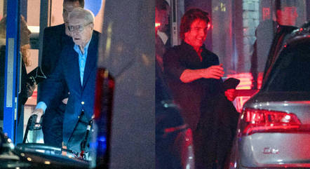 Michael Caine usa andador e recebe ajuda de Tom Cruise após festona em Londres