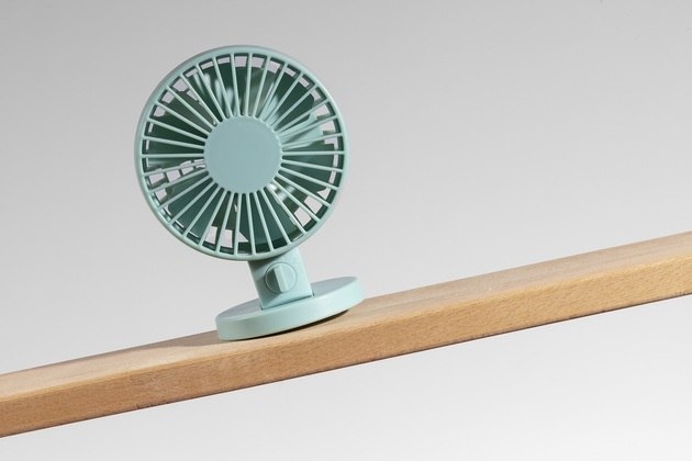 Mini ventilador verde-água. Freepik