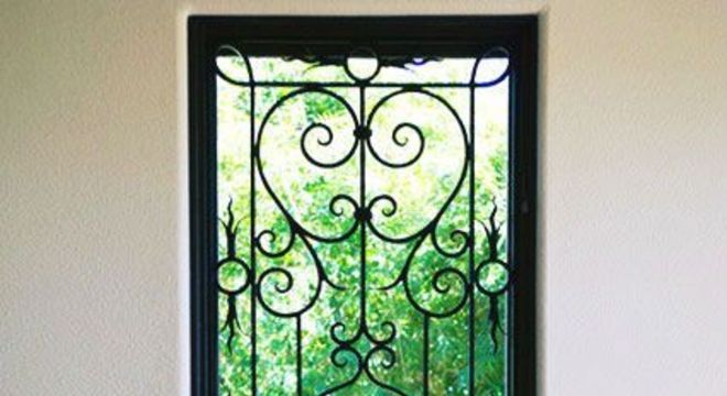modelos de grades - grade decorada preta em anela grande 