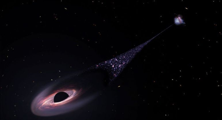 Ilustração produzida pela Nasa mostrando o buraco negro e o rastro de estrelas