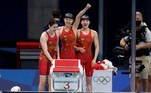 Gold medallist China's Li Bingjie, China's Yang Junxuan, China's Tang Muhan and China's Zhang Yufei pose with their medals after they set a new World Record in the final of the women's 4x200m freestyle relay swimming event during the Tokyo 2020 Olympic Games