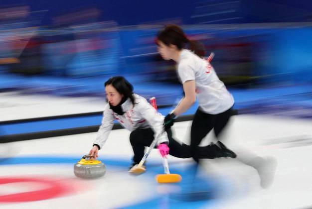 Japonesas durante a competição de Curling Japonesas durante a competição de Curling