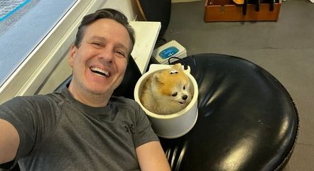 Celso Zucatelli com o seu cão, Paçoca