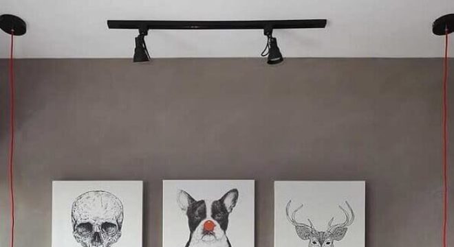 parede cinza quarto decorado com pendente minimalista e trilho de luz 