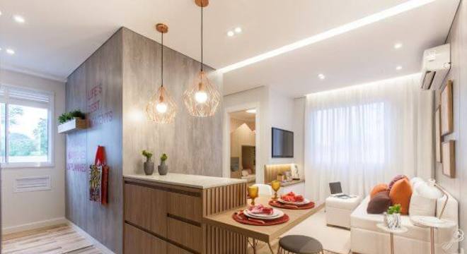 Pendente aramado rose gold na bancada da cozinha