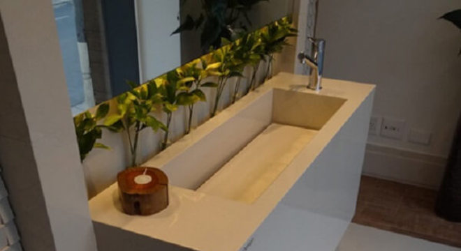 Pia de porcelanato com cuba retangular esculpida